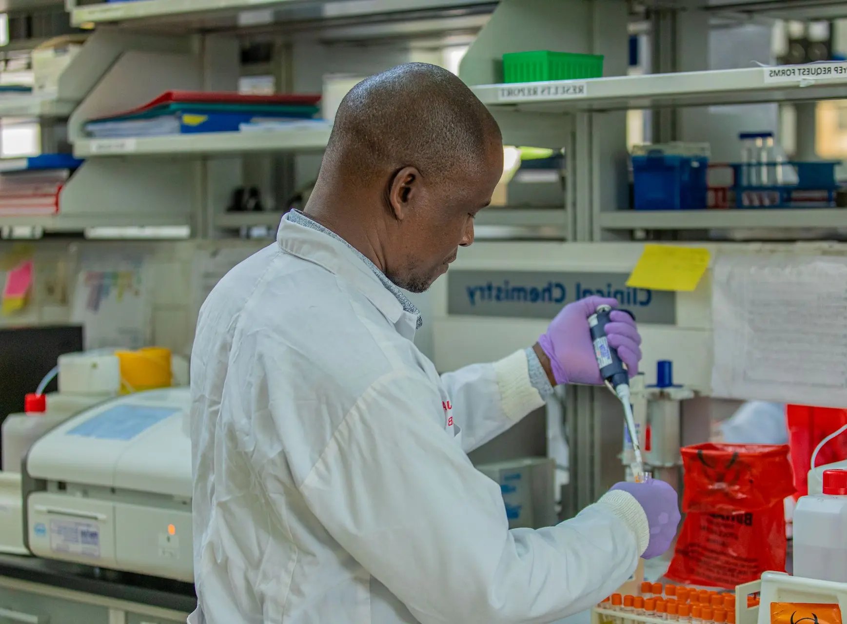 A laboratory scientist at work in the Rakai Health Sciences Programme clinical chemistry lab